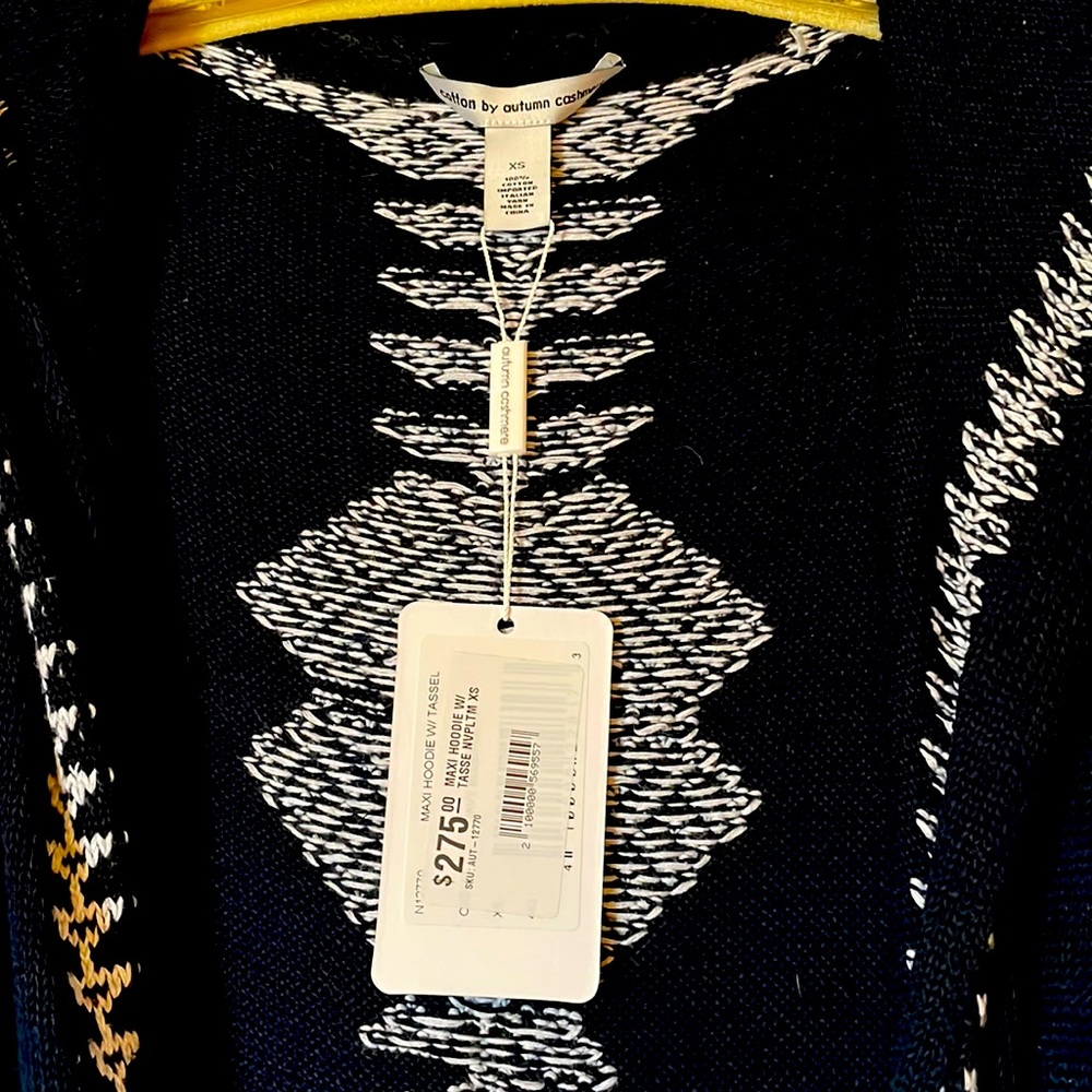 Navy cardigan with white trim designs and hood